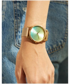 Modern Ombre Green Watch Showcasing a Metallic Mesh Strap and Refreshing Contemporary Look